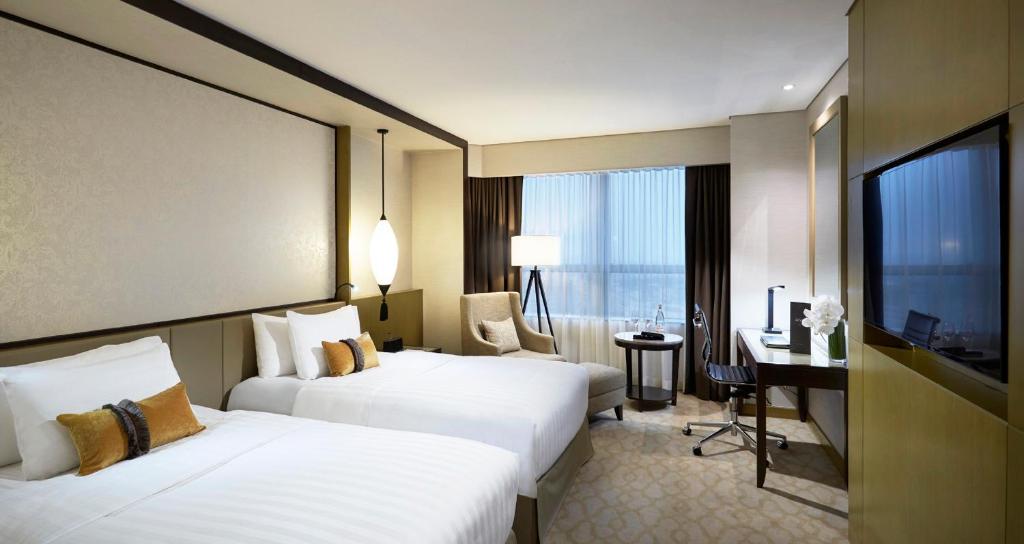 Phòng Deluxe mang một không gian thật tiện nghi và thoải mái tại Melia Hanoi